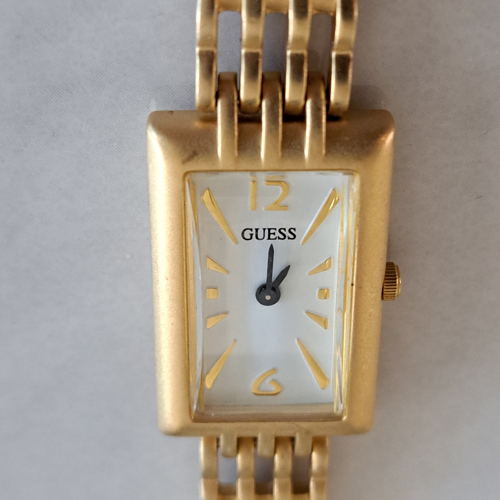 Beautiful Guess Watch With Gold Tone Bracelet Band